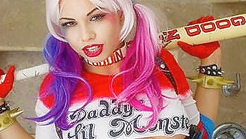 Sexy blonde model shows off and in the park